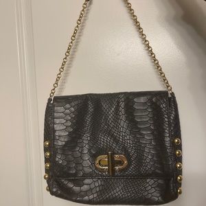 Leather bag with gold hardware